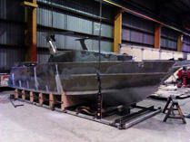 Boat with cabin frame on cradle