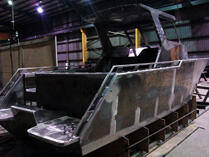 Stern with transom door and cabin