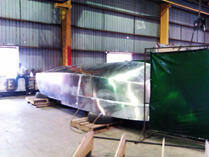 Inverted hull with welding screen