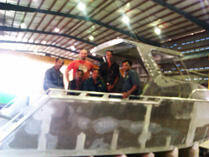 Team photo with finished boat
