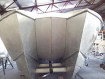 Boat hull rear view in workshop