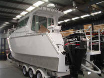 Cabin cruiser with twin Suzukis