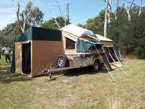 Camper trailer with awning