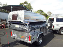 Camper trailer rear with boat