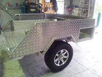 Checker plate camper trailer