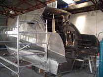 Cruiser stern with scaffolding