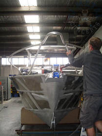 Fitting bow rail in workshop
