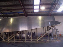 Hull on timber cradle