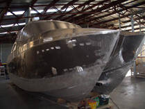 Large cruiser hull in workshop
