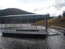 Covered pontoon dock on lake