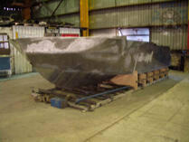 Raw hull on blocks
