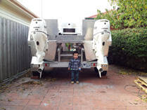 Twin outboard boat on trailer